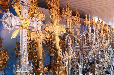 Offering of Gold  and Silver cross.